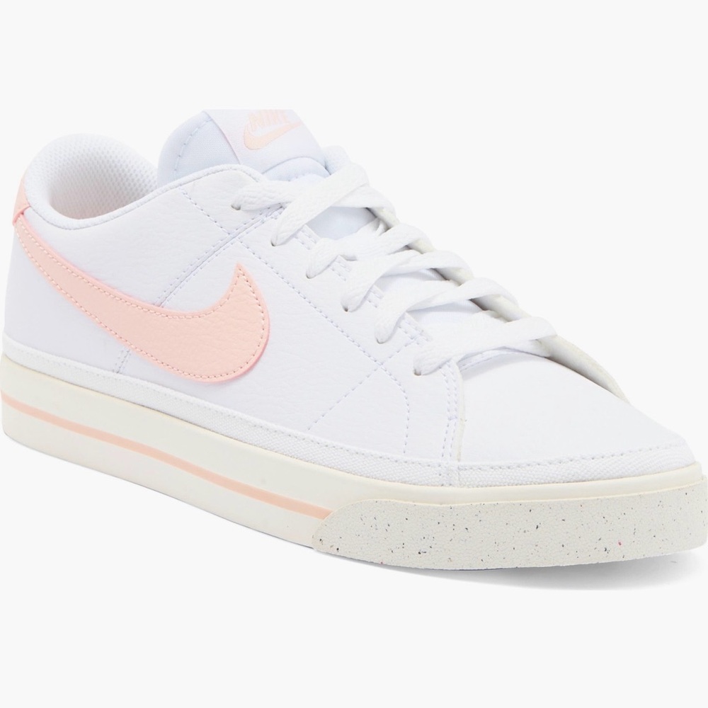 Nike Women's White and Soft Pink Sneakers. Nike
Court Legacy Sneaker